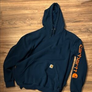 Carhartt Men's Blue Hoodie with Orange Sleeve Logo